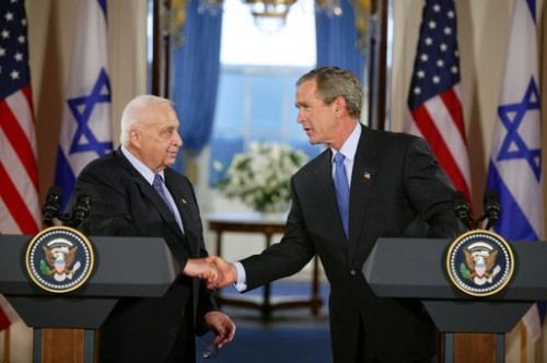 Ariel Sharon and George W Bush - War criminals meet and greet.
